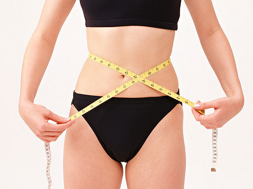 Look slimmer with a spray tan